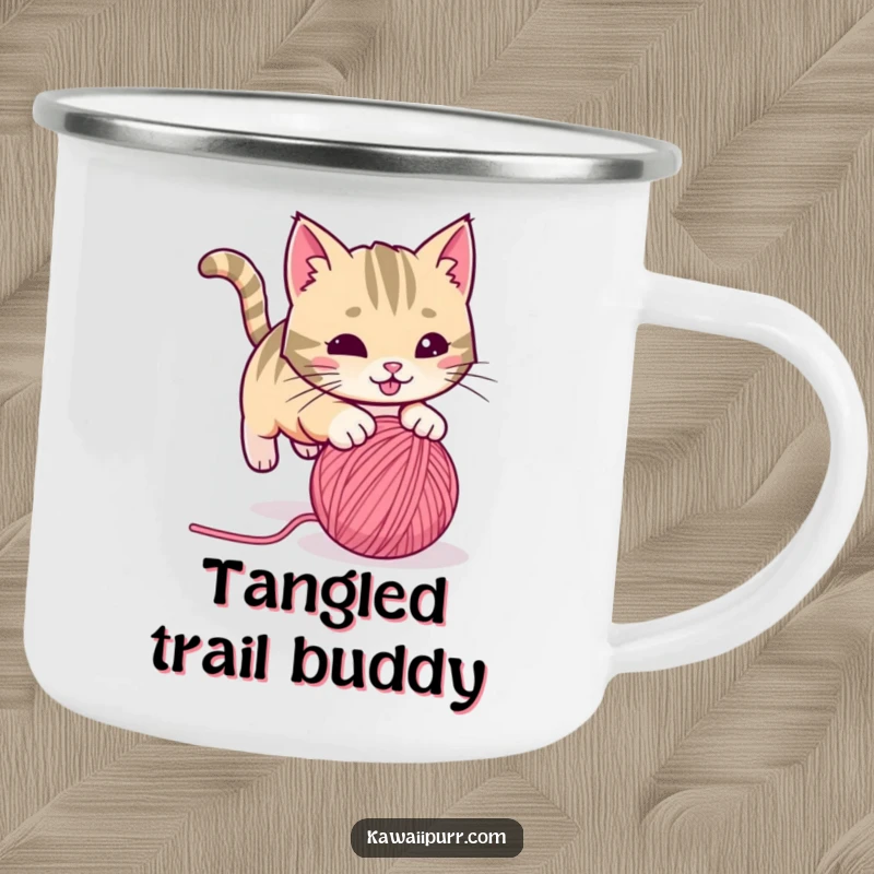 Funny playful cat with a twitching tail, pouncing on a rolling ball of yarn, on a camping mug. Humorous and durable for outdoor enjoyment.