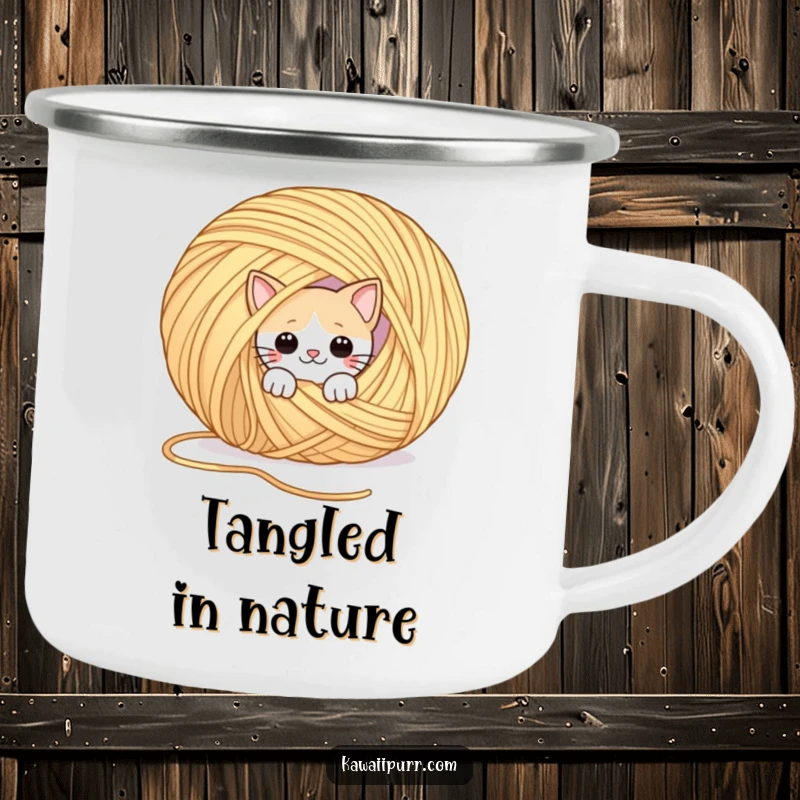 Funny camping mug featuring a playful cat peeking from behind a giant ball of yarn. Perfect for playful outdoor enjoyment.