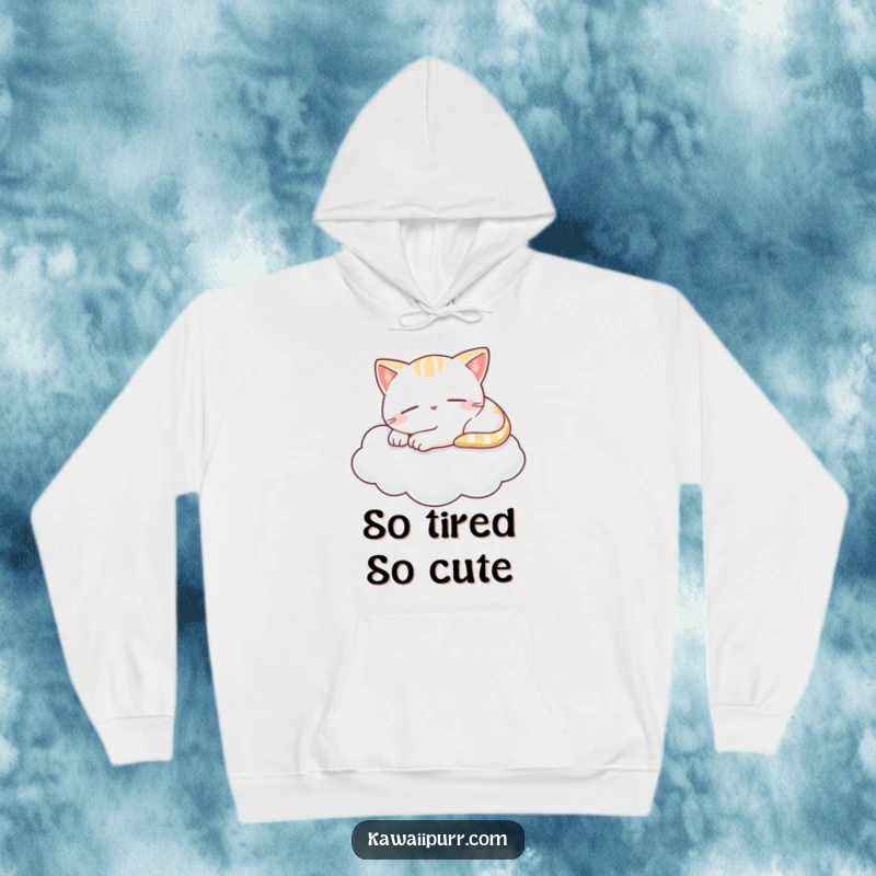 Funny hoodie with a content kawaii cat napping peacefully on a cloud, sporting a tiny smile, perfect for cozy, relaxing moments.