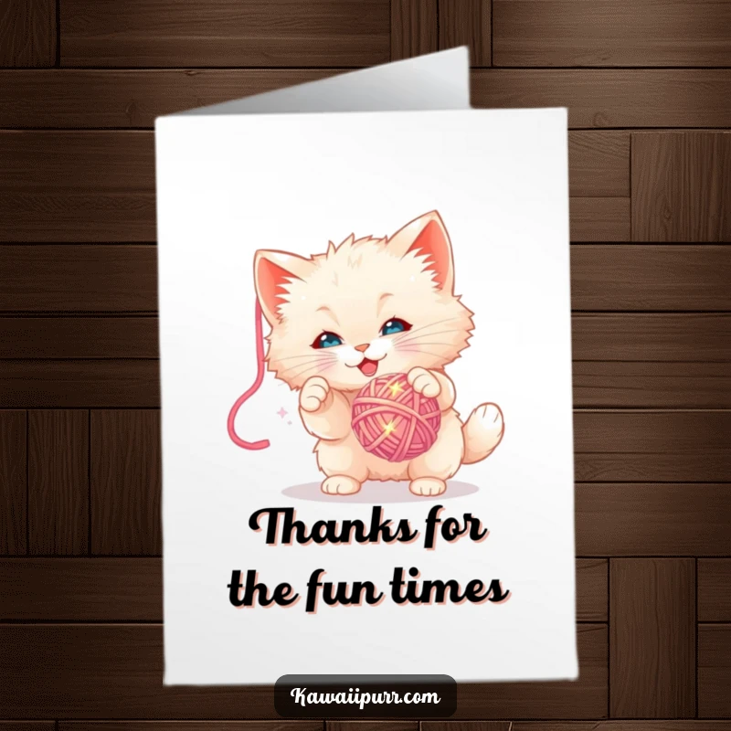 Funny Free Printable Thank You Card: A fluffy kitten enthusiastically batting at a dangling sparkly yarn ball, a cute downloadable thank you.