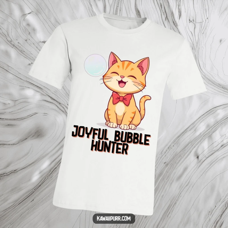 Funny t-shirt with a ginger cat in a bowtie joyfully batting at a floating bubble.