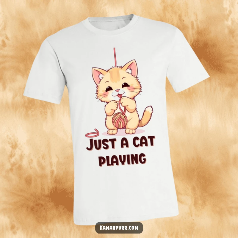 Funny fuzzy cat t-shirt, actively engaged in batting a suspended ball of yarn, showcasing pure playful energy.